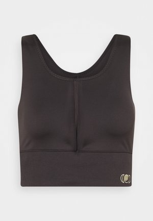 Top sportivo corto nero con scollo rotondo, design elegante, tessuto strutturato e dettaglio logo sottile in basso a sinistra.