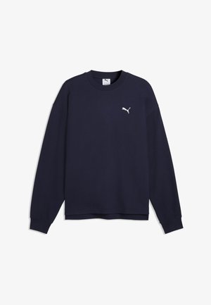 Marineblaue Puma Sweatshirt mit langen Ärmeln, Rundhalsausschnitt und kleinem weißem Puma-Logo auf der linken Brust.