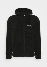 Svart fleece zip-up hettegenser med hette, snorer og en liten logo på brystet. Teksturert stoff med sidelommer.