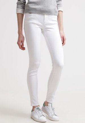 Vaqueros pitillo - white denim