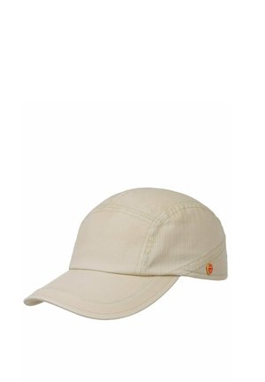 Beige fabric baseball cap with visible stitching and a small round red and yellow logo on the side.