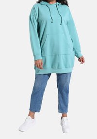 Modanisa Bluza z kapturem