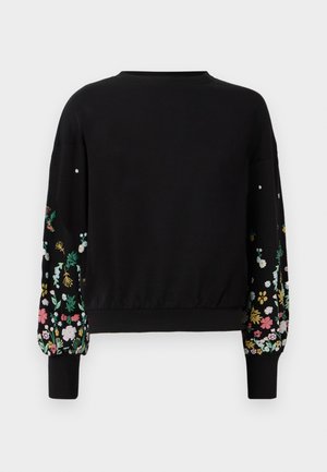Black sweatshirt with floral embroidery on the sleeves, a relaxed fit, ribbed cuffs, and a rounded neckline. Soft, textured fabric.