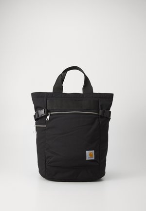 Sort Carhartt tote taske med top-håndtag, frontlynlåslomme, sidelåse og et lille brandlogo-patch.
