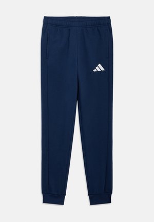 Nautisch blauwe sportbroek van zachte stof, met een elastische tailleband, zijzakken en een wit Adidas-logo op het bovenste linkerbeen.