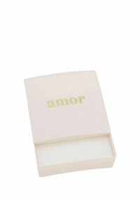 Pequeña caja cuadrada blanca, abierta, con el texto dorado "amor" en la tapa, vacía por dentro, colocada sobre un fondo blanco.