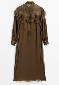 Olivgrön långärmad klänning i lätt tyg, med volangdetaljer, genomskinliga paneler och ett knytbälte i midjan.