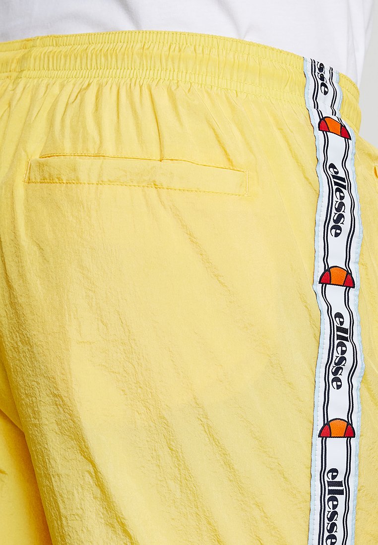 yellow ellesse tracksuit