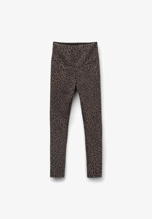 Leggings con estampado de leopardo en tonos marrón y negro, con una cinturilla ancha y un diseño ajustado. Tejido liso y elástico.