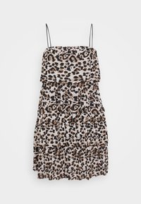 Leopardų rašto suknelė su sluoksniuotais volanais, su juodais ir smėlio spalvos taškais ant šviesaus fono. Sukurta su reguliuojamomis spaghetti petnešomis.