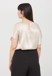 Terranova Camicetta - fango