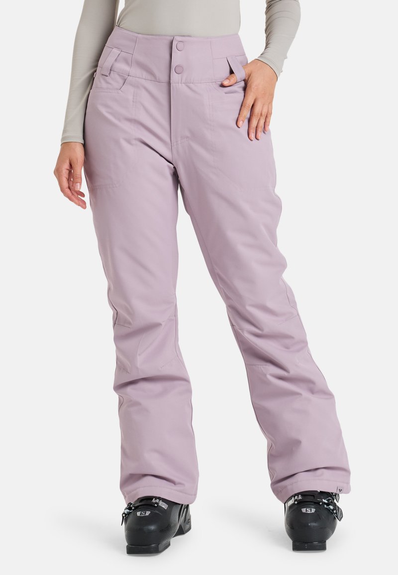 Paarse skibroek met een hoge taille, twee voorzakken en knoopsluitingen. Gemaakt van een gladde, duurzame stof en heeft een ruime pasvorm.