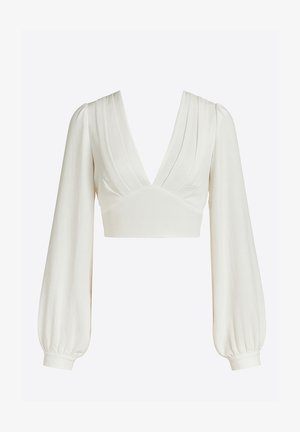 Witte cropped blouse met lange, pofmouwen. Heeft een diepe V-hals en zachte, geplooide stof, die een vloeiende textuur en silhouet creëren.
