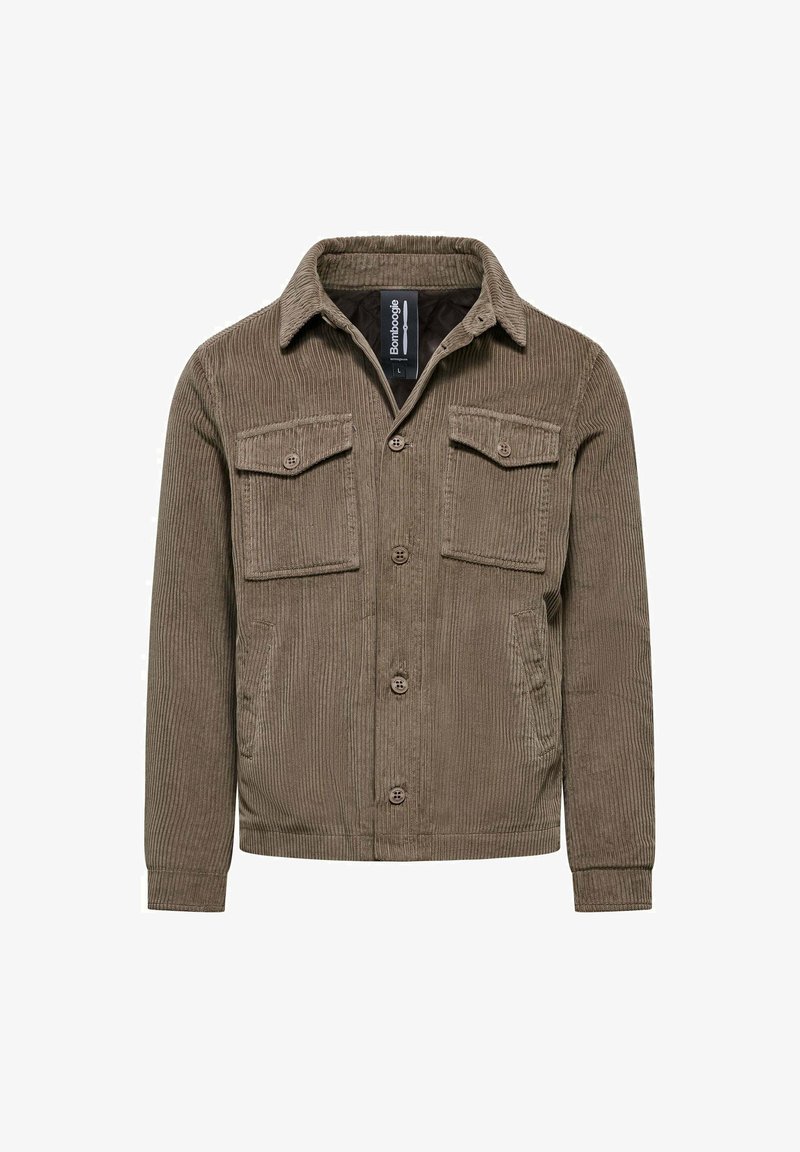 Giacca in corduroy marrone con colletto, due tasche sul petto e chiusura con bottoni. Presenta una texture a costine e maniche lunghe.