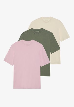 Three short-sleeve t-shirts in light pink, olive green, and cream. Made of smooth fabric with crew necks and relaxed fit.
