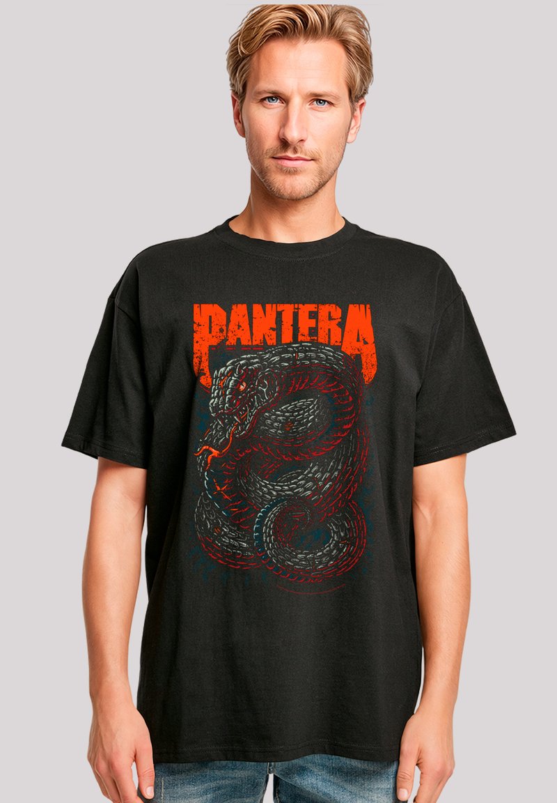 Black cotton t-shirt featuring a colorful snake graphic and "PANTERA" text in red, with a relaxed fit and short sleeves.
