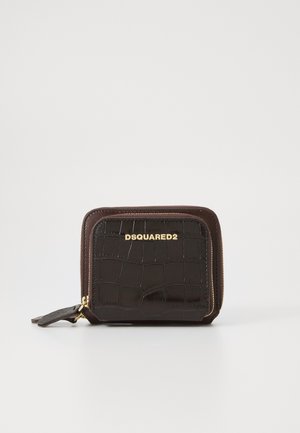 Brown crocodile-embossed leather wallet with gold logo, zip closure, and a side tassel detail. Compact design with textured finish.