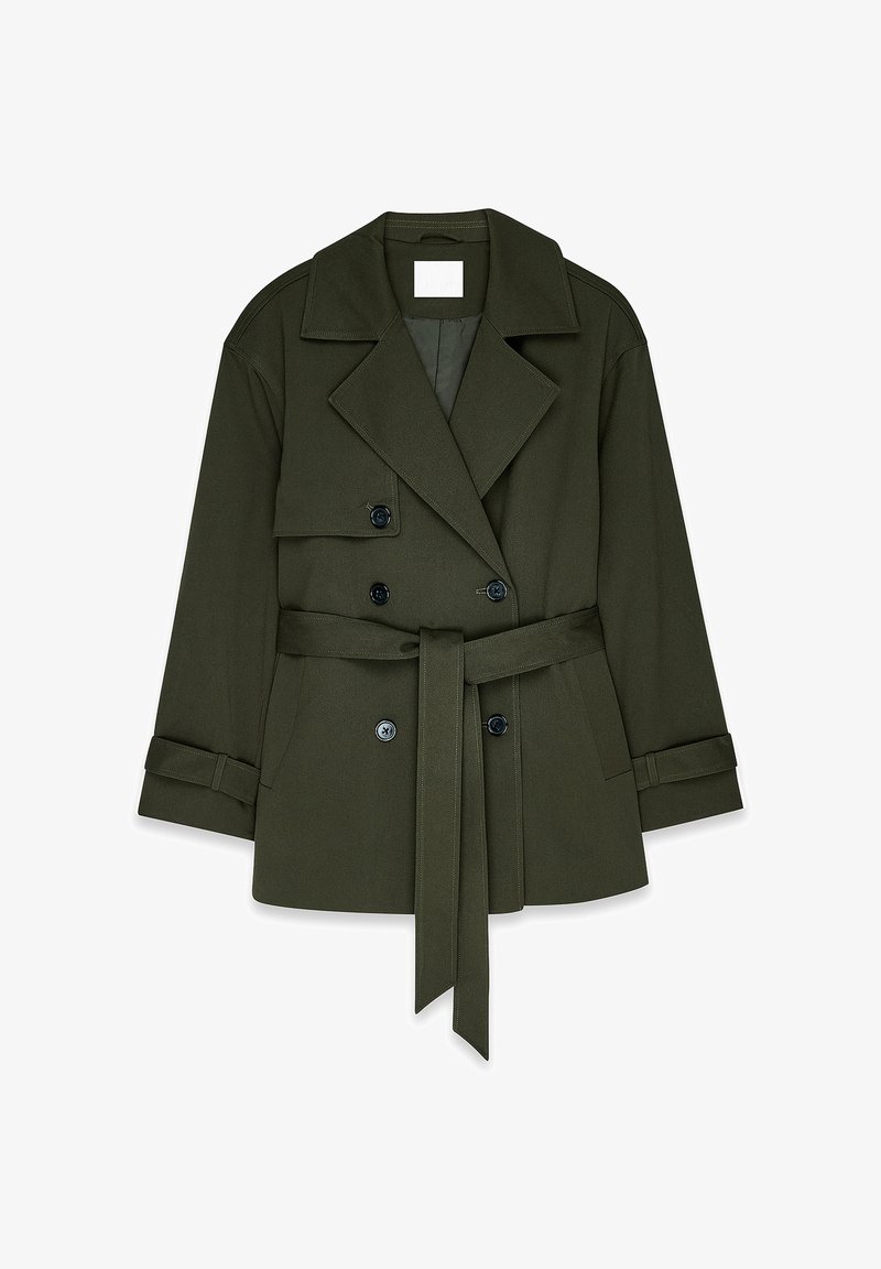 Olive green double-breasted jacket with a wide collar, adjustable cuffs, and a matching belt; smooth texture and minimalistic design.
