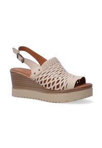 Beige wedge sandalen met open teen, uitgesneden ontwerp, leren bovenwerk, verstelbare slingbackband en een gestructureerde, gegroefde zool.
