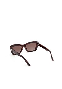 Tortoiseshell sunglasses with a wide, angular frame, dark tinted lenses, and slender arms featuring a small logo detail on the hinge.