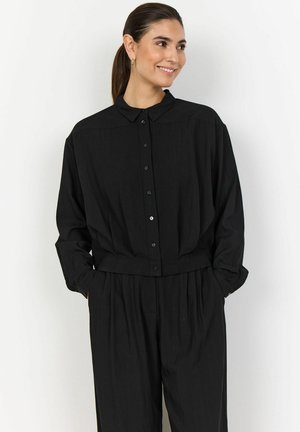 Black button-up shirt with a collar, long sleeves, and a relaxed fit; made of lightweight fabric with a smooth texture and minimal design.
