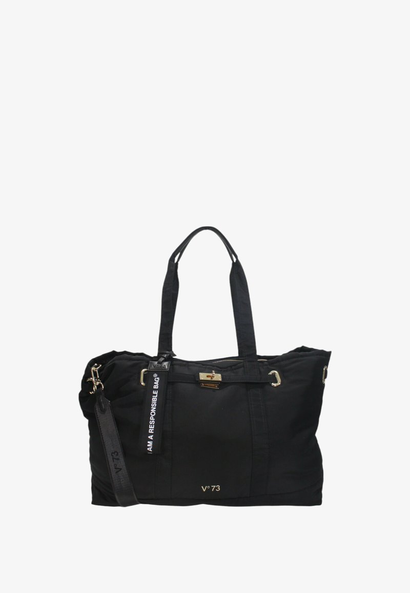 Bolso tote de nylon negro con herrajes dorados, asas dobles y una correa desmontable. Presenta una etiqueta prominente que dice "SOY UN BOLSO RESPONSABLE."