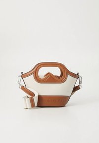 Tan and cream handbag with a structured design, a top handle, and adjustable strap. Features raised logo on the base and contrasting accents.