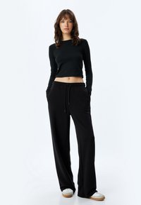 Koton Pantalones deportivos - black