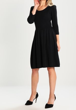 Stickad klänning - black