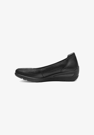 Black flat shoe with leather and mesh uppers, rounded toe, low wedge heel, and textured design along the sides. Durable rubber outsole.