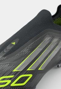 adidas Performance F50 ELITE LL FG - Nogometne kopačke za čvrstu podlogu - core black/iron metallic/lucid lemon
