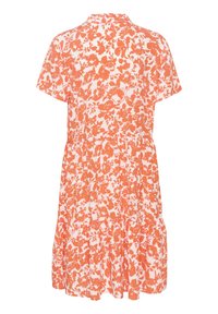 Robe courte à manches courtes, longueur genou, imprimé floral orange sur fond blanc, taille froncée et jupe à volants.