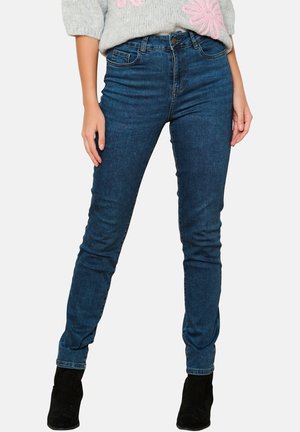 Tmavě modré skinny džíny, směs bavlny, vysoký pas, s klasickým designem pěti kapes a jemným vyblednutím na stehnech.