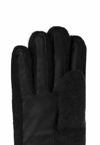 Schwarze Handschuhe aus einer Kombination von Leder und Wollmaterial. Das Design umfasst Fingerbereiche und eine strukturierte Wollaußenseite.