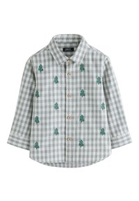 Chemise à carreaux gris et blancs à manches longues, ornée de sapins verts brodés et de boutons en bois sur le devant.