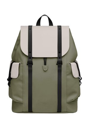 Olive green backpack with a cream top flap, black straps, and side pockets. Made from durable material with a sleek design.