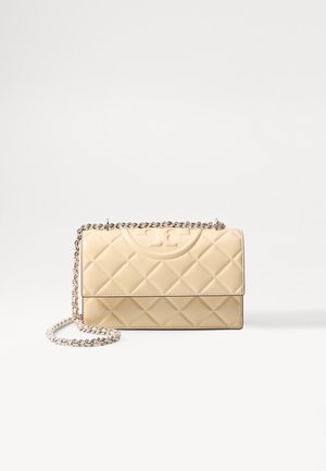 Quilted beige leather handbag with a silver-tone chain strap. Features a front flap and embossed logo detail on the top.