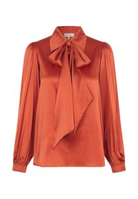 Rostorange Satinstoffbluse mit einer großen Schleife am Kragen, langen Puffärmeln mit elastischen Bündchen und einem lockeren Schnitt. Glatte Textur.