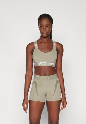BRA - Kergelt toetav spordirinnahoidja - light army/white