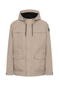 Beige hættetrøjejakke med forreste lynlås, justerbare snore, to forlommer med klap og sort inderfor.