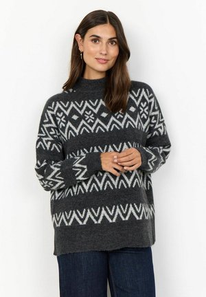 Knit sweater in dark gray with white geometric patterns, featuring a high neck, long sleeves, and a relaxed fit. Textured wool blend fabric.