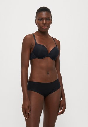 Black padded bra with adjustable straps, smooth surface, and seamless design. Paired with matching black bikini-cut underwear.