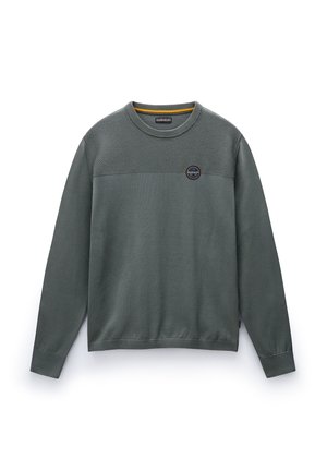 Green sweatshirt with a textured upper section, ribbed cuffs and hem, round neck, and a circular logo detail on the chest.