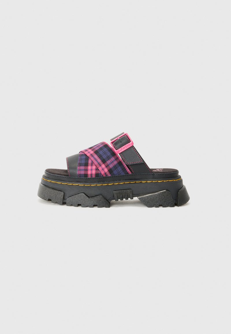 Black platform sandal with a quilted plaid upper in purple and pink, adjustable strap, and pronounced textured sole with yellow stitching.