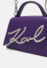 KARL LAGERFELD SIGNATURE - Ručna torba - deep purple