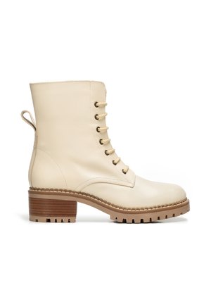 Stivaletti con plateau - creme