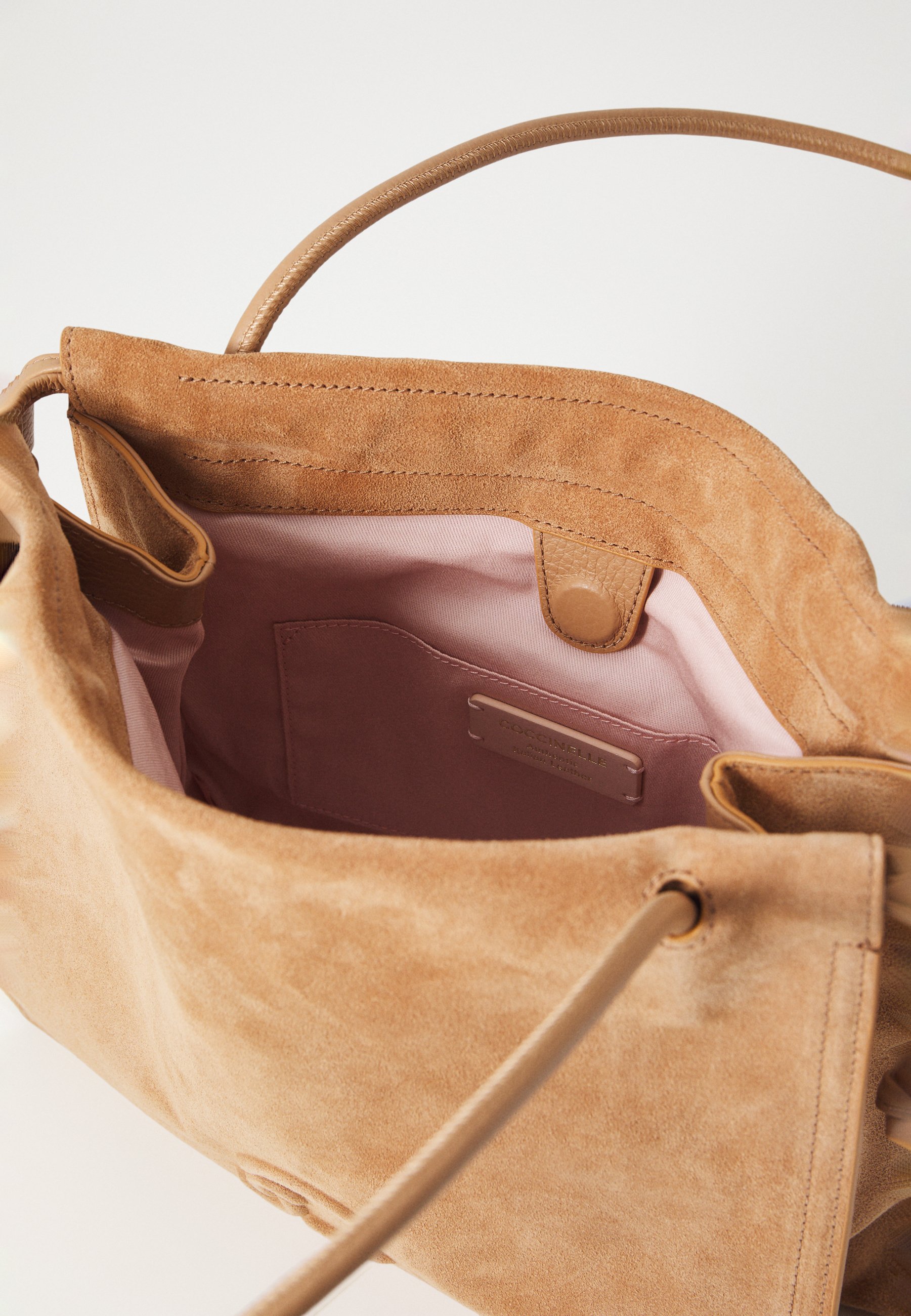 Coccinelle Handbag - skin/sand - Zalando.co.uk