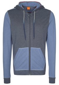 Sudadera con cremallera en tejido azul oscuro y azul claro, con un diseño de dos tonos, mangas largas, dos bolsillos frontales y capucha con cordón.