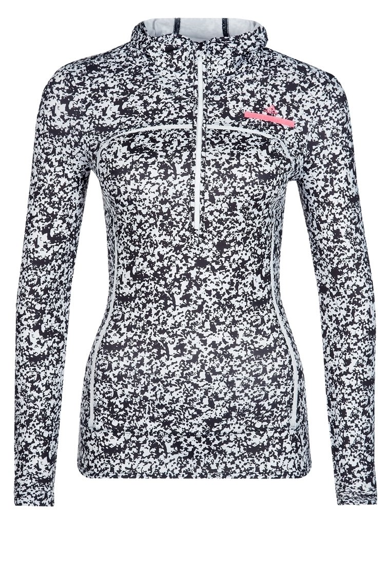 Långärmad idrottströja i svart och vitt kamouflagemönster, med halvdragkedja och rosa logotyp på bröstet. Tillverkad av stretchigt material.