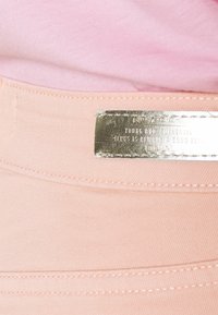 ONLY ONLBLUSH ANKRAW - Calças de ganga de corte skinny - misty rose